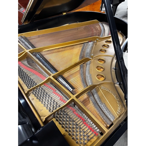 15 - Steinway (c1936)A 5ft 7in Model M grand piano in an ebonised case on square tapered legs; together w... 