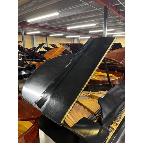 15 - Steinway (c1936)A 5ft 7in Model M grand piano in an ebonised case on square tapered legs; together w... 