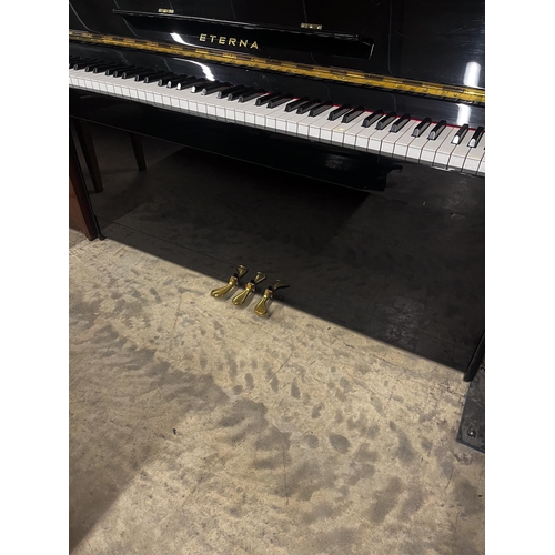 16 - Eterna (c2002) (by Yamaha)A Model ER-C10 upright piano in a modern style bright ebonised case.