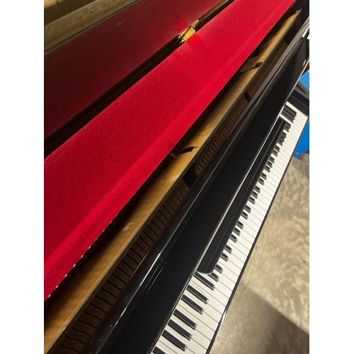 16 - Eterna (c2002) (by Yamaha)A Model ER-C10 upright piano in a modern style bright ebonised case.