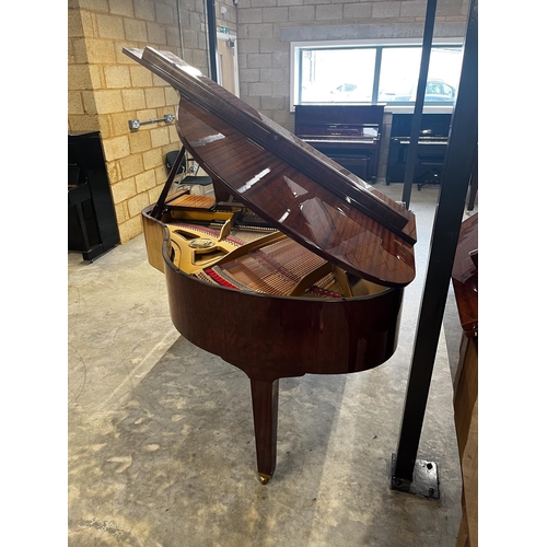 17 - Petrof (c1990)A 5ft 1in Model V grand piano in a bright mahogany case on square tapered legs.
