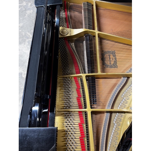 18 - Yamaha (c1984)A 6ft 1in Model C3 grand piano in a bright ebonised case on square tapered legs.