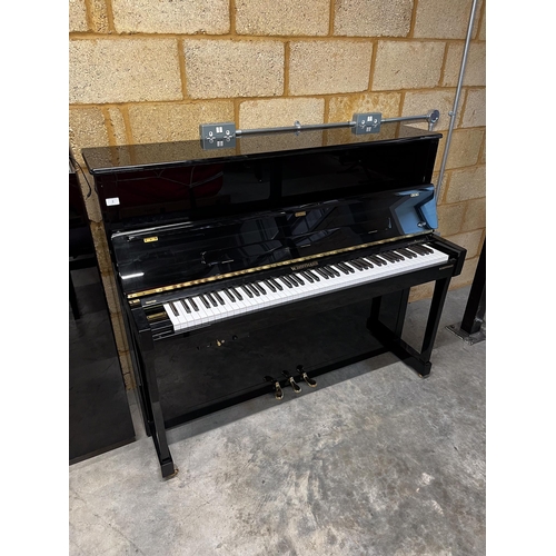 2 - Hoffmann (c2020)A Model T122 upright piano in a traditional bright ebonised case and fitted with a s... 