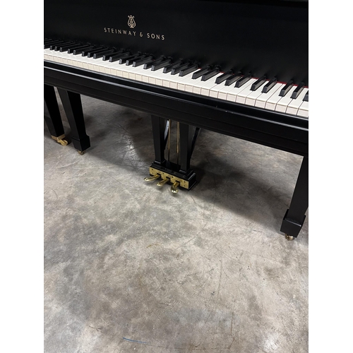 20 - Steinway (c1976)A 5ft 7in New York Model M grand piano in an ebonised case on square tapered legs.... 
