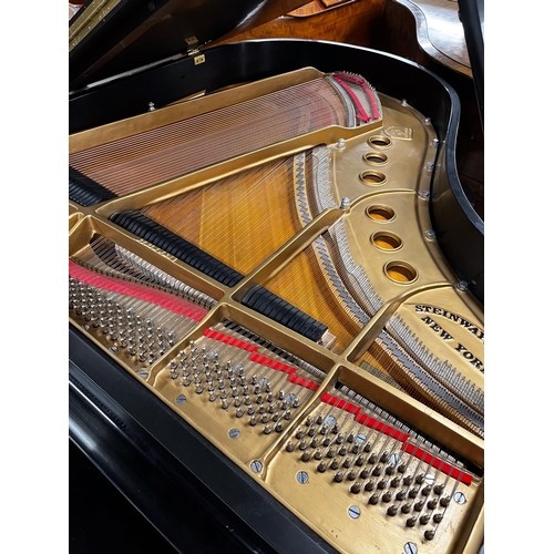 20 - Steinway (c1976)A 5ft 7in New York Model M grand piano in an ebonised case on square tapered legs.... 