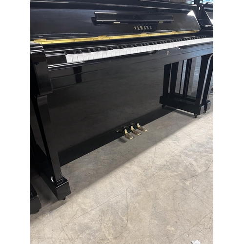 21 - *Yamaha (c1978)A Model U1H upright piano in a traditional bright ebonised case. There is VAT on this... 