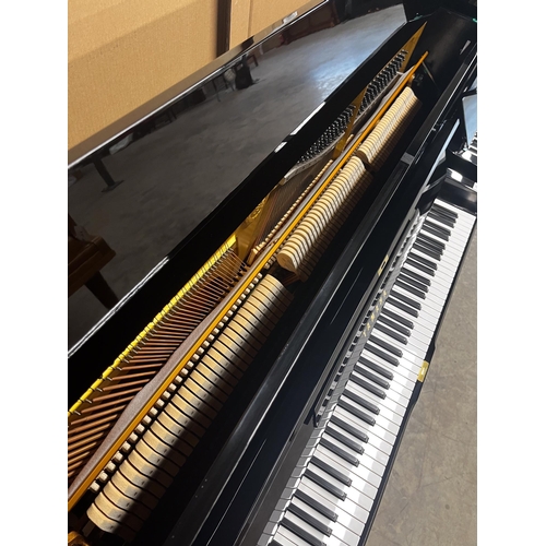 21 - *Yamaha (c1978)A Model U1H upright piano in a traditional bright ebonised case. There is VAT on this... 