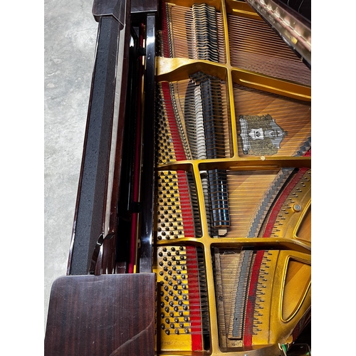 24 - Offenbach by DaewooA recent 5ft grand piano in a bright mahogany case on square tapered legs; togeth... 