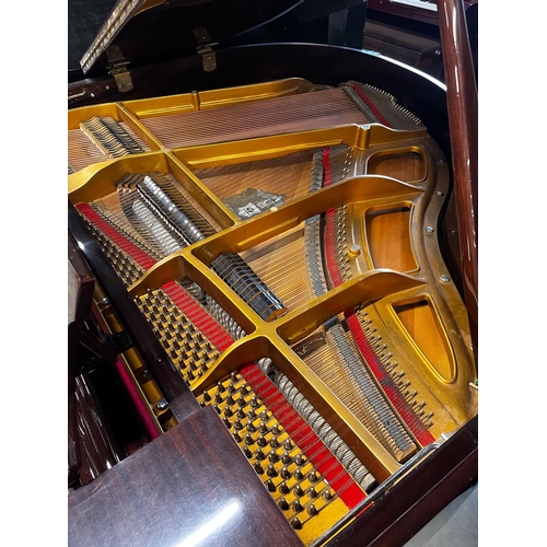 24 - Offenbach by DaewooA recent 5ft grand piano in a bright mahogany case on square tapered legs; togeth... 