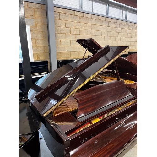 24 - Offenbach by DaewooA recent 5ft grand piano in a bright mahogany case on square tapered legs; togeth... 