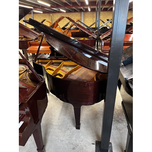 24 - Offenbach by DaewooA recent 5ft grand piano in a bright mahogany case on square tapered legs; togeth... 