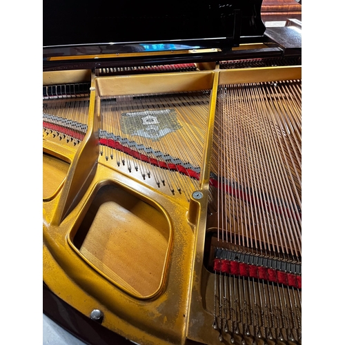 24 - Offenbach by DaewooA recent 5ft grand piano in a bright mahogany case on square tapered legs; togeth... 