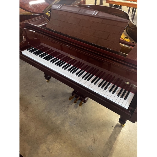28 - Challen (c2004)A 4ft 7in grand piano in a bright mahogany case; together with a matching stool and g... 
