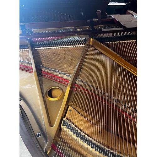 28 - Challen (c2004)A 4ft 7in grand piano in a bright mahogany case; together with a matching stool and g... 
