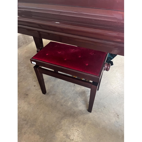 28 - Challen (c2004)A 4ft 7in grand piano in a bright mahogany case; together with a matching stool and g... 