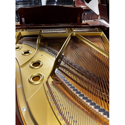 29 - Yamaha (c1989)A 6ft 1in Model C3 grand piano in a bright mahogany case on square tapered legs.