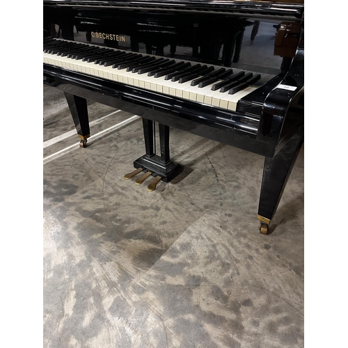 30 - Bechstein (c1973)A 7ft 4in Model C grand piano in a bright ebonised case on square tapered legs. Thi... 