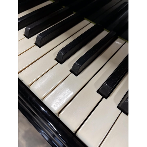 30 - Bechstein (c1973)A 7ft 4in Model C grand piano in a bright ebonised case on square tapered legs. Thi... 