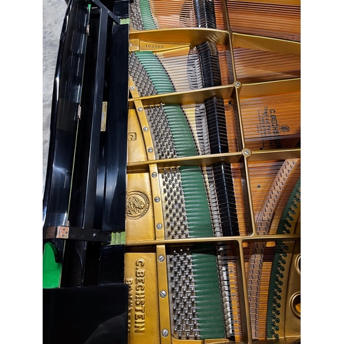 30 - Bechstein (c1973)A 7ft 4in Model C grand piano in a bright ebonised case on square tapered legs. Thi... 