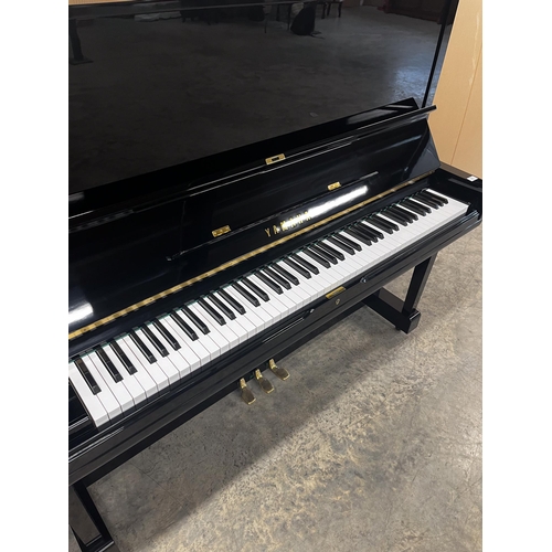 31 - *Yamaha (c1980)A Model U3H upright piano in a traditional bright ebonised case. There is VAT on this... 