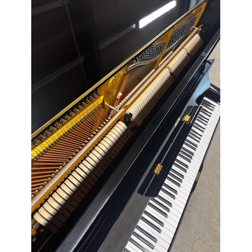31 - *Yamaha (c1980)A Model U3H upright piano in a traditional bright ebonised case. There is VAT on this... 