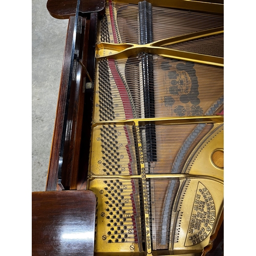 32 - Steinway (1905)A 5ft 10in Model O grand piano in a rosewood case on square tapered legs; together wi... 
