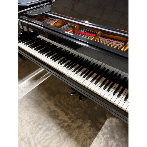 35 - Steinway (c1878)A 7ft 2in early Model C grand piano in a bright ebonised case on later square tapere... 