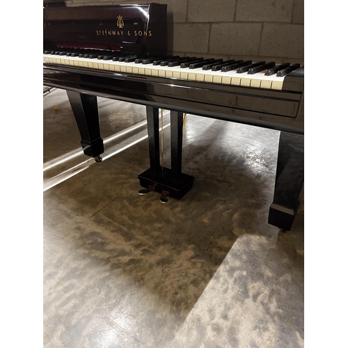 35 - Steinway (c1878)A 7ft 2in early Model C grand piano in a bright ebonised case on later square tapere... 