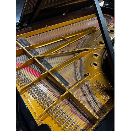 35 - Steinway (c1878)A 7ft 2in early Model C grand piano in a bright ebonised case on later square tapere... 