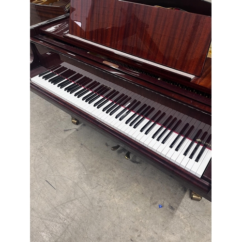 36 - Petrof (c1990)A 5ft 3in Model V grand piano in a bright mahogany case on square tapered legs.