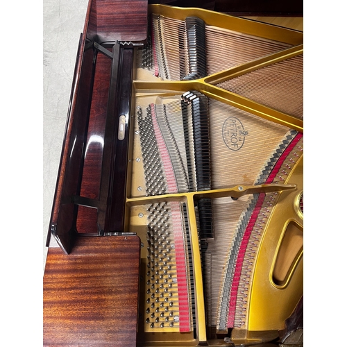 36 - Petrof (c1990)A 5ft 3in Model V grand piano in a bright mahogany case on square tapered legs.