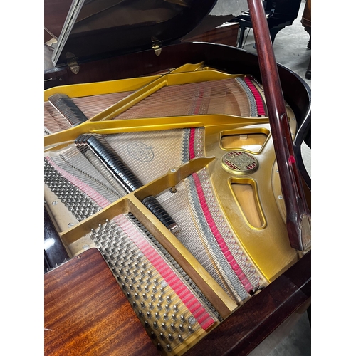 36 - Petrof (c1990)A 5ft 3in Model V grand piano in a bright mahogany case on square tapered legs.