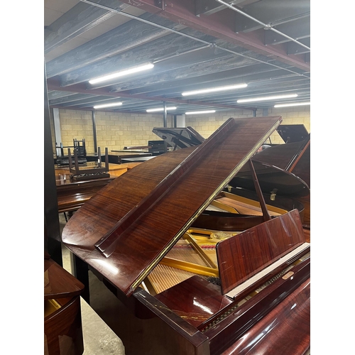 36 - Petrof (c1990)A 5ft 3in Model V grand piano in a bright mahogany case on square tapered legs.