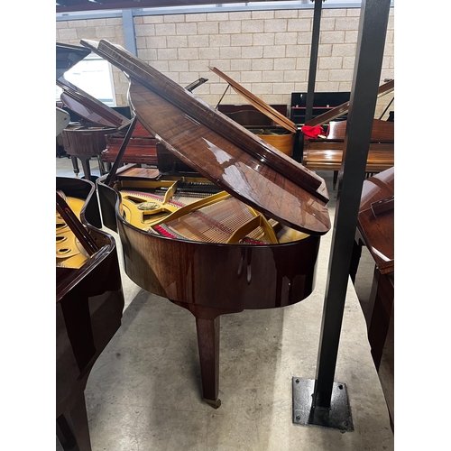 36 - Petrof (c1990)A 5ft 3in Model V grand piano in a bright mahogany case on square tapered legs.