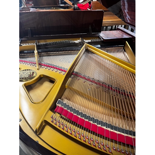 36 - Petrof (c1990)A 5ft 3in Model V grand piano in a bright mahogany case on square tapered legs.