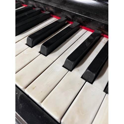 37 - Steinway (c1891)An upright piano in an ebonised case; together with a stool. IRN: HXWCNZAH