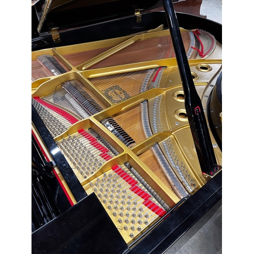 38 - Yamaha (c1985)A 6ft 1in Model C3 grand piano in a bright ebonised case on square tapered legs.