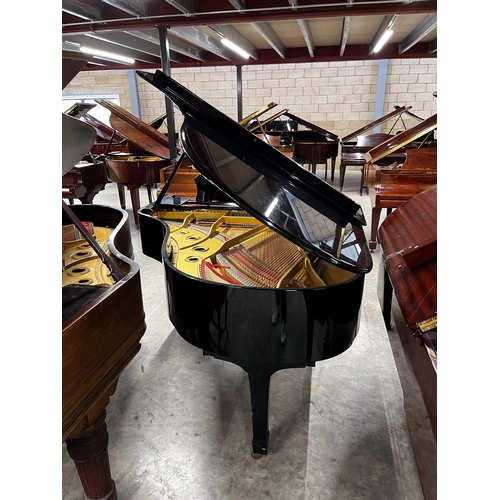 38 - Yamaha (c1985)A 6ft 1in Model C3 grand piano in a bright ebonised case on square tapered legs.
