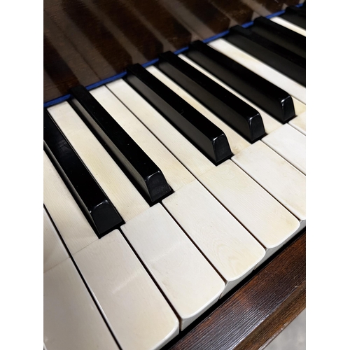 39 - Blüthner (c1937)A 4ft 11in Model 4 grand piano in a walnut case on square tapered legs. IRN: 974FLSY... 