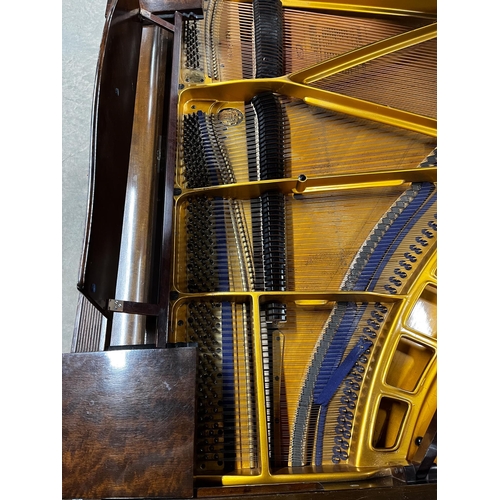 39 - Blüthner (c1937)A 4ft 11in Model 4 grand piano in a walnut case on square tapered legs. IRN: 974FLSY... 