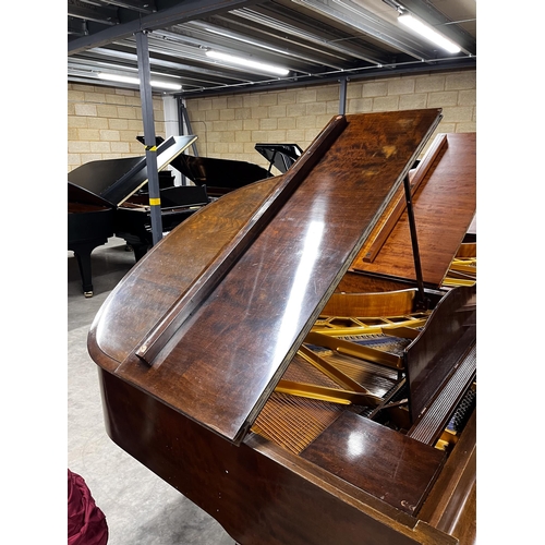 39 - Blüthner (c1937)A 4ft 11in Model 4 grand piano in a walnut case on square tapered legs. IRN: 974FLSY... 
