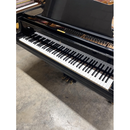 40 - Steinway (c1981)A 9ft Model D concert grand piano in a satin ebonised case on square tapered legs.... 