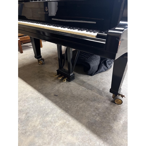 40 - Steinway (c1981)A 9ft Model D concert grand piano in a satin ebonised case on square tapered legs.... 
