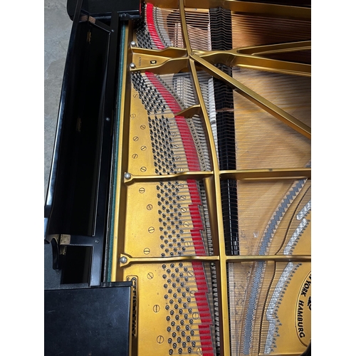 40 - Steinway (c1981)A 9ft Model D concert grand piano in a satin ebonised case on square tapered legs.... 