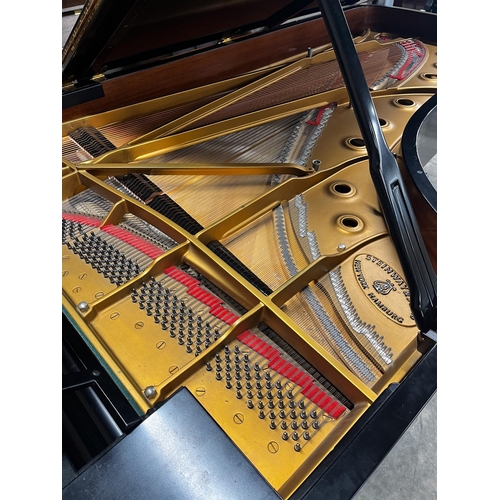 40 - Steinway (c1981)A 9ft Model D concert grand piano in a satin ebonised case on square tapered legs.... 
