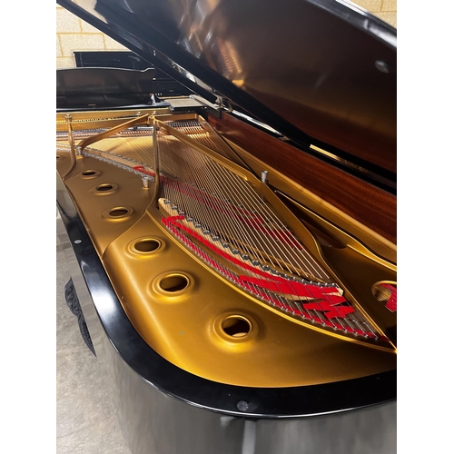 40 - Steinway (c1981)A 9ft Model D concert grand piano in a satin ebonised case on square tapered legs.... 