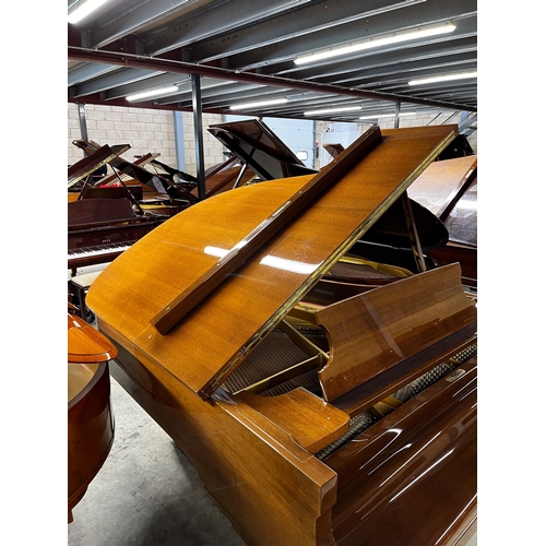 42 - Schimmel (c1988)A 5ft 8in Model 174T grand piano in bright walnut case on square tapered legs.