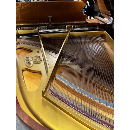 42 - Schimmel (c1988)A 5ft 8in Model 174T grand piano in bright walnut case on square tapered legs.