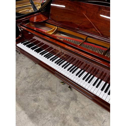 45 - Steinway (c1906)A 5ft 10in Model O grand piano in a bright figured mahogany case on square tapered l... 