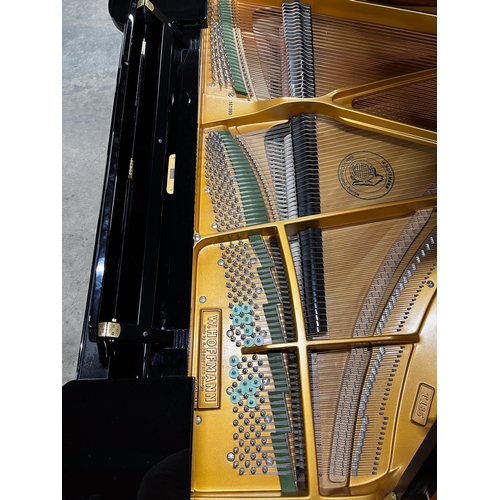 46 - Hoffmann (c2012)A 6ft 1in Model T186 grand piano in a bright ebonised case on square tapered legs.... 